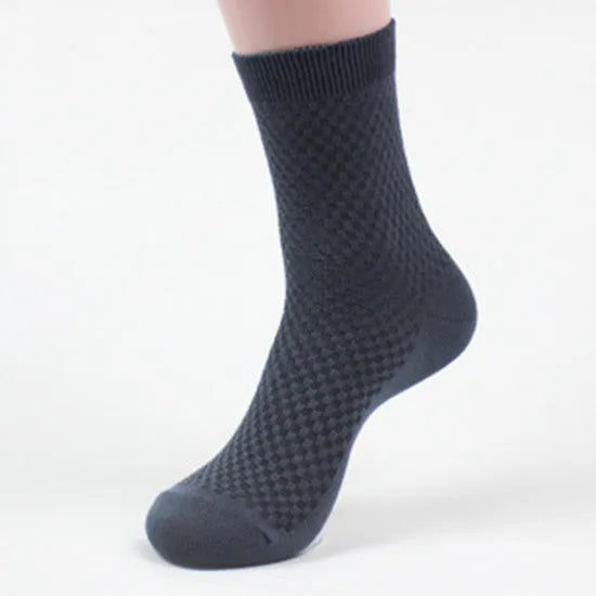 Men's bamboo fibre socks with small square pattern in black, grey, blue, and navy colours