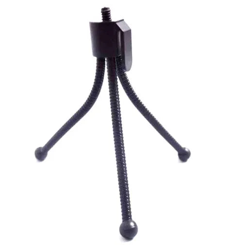 Small iron desktop tripod with ball head in folded position showing compact size