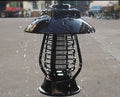 White solar mosquito lamp with purple switch, solar panel top, and LED insect attraction beads for garden outdoor use