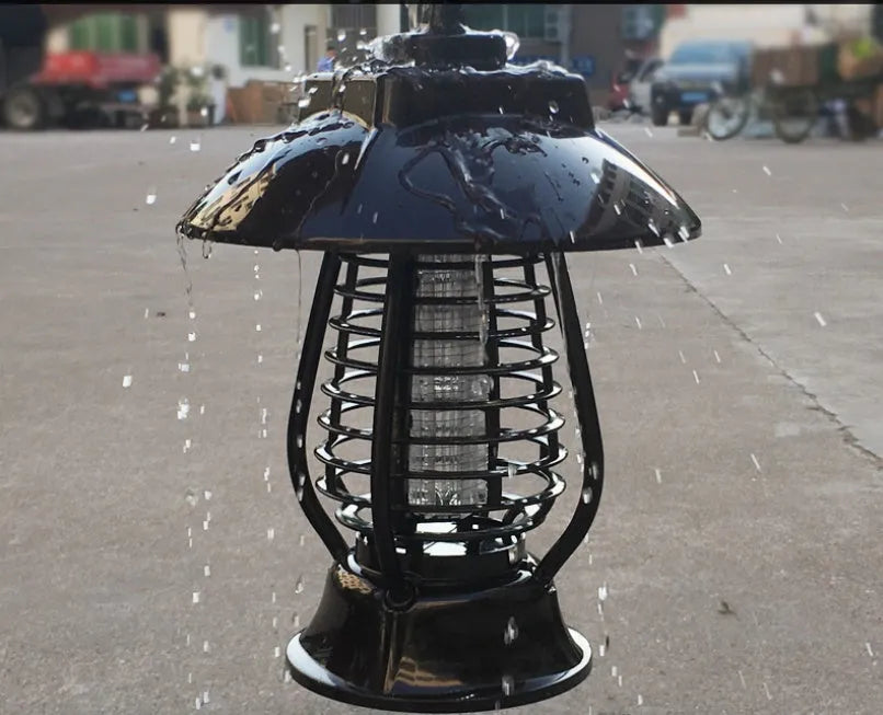 White solar mosquito lamp with purple switch, solar panel top, and LED insect attraction beads for garden outdoor use