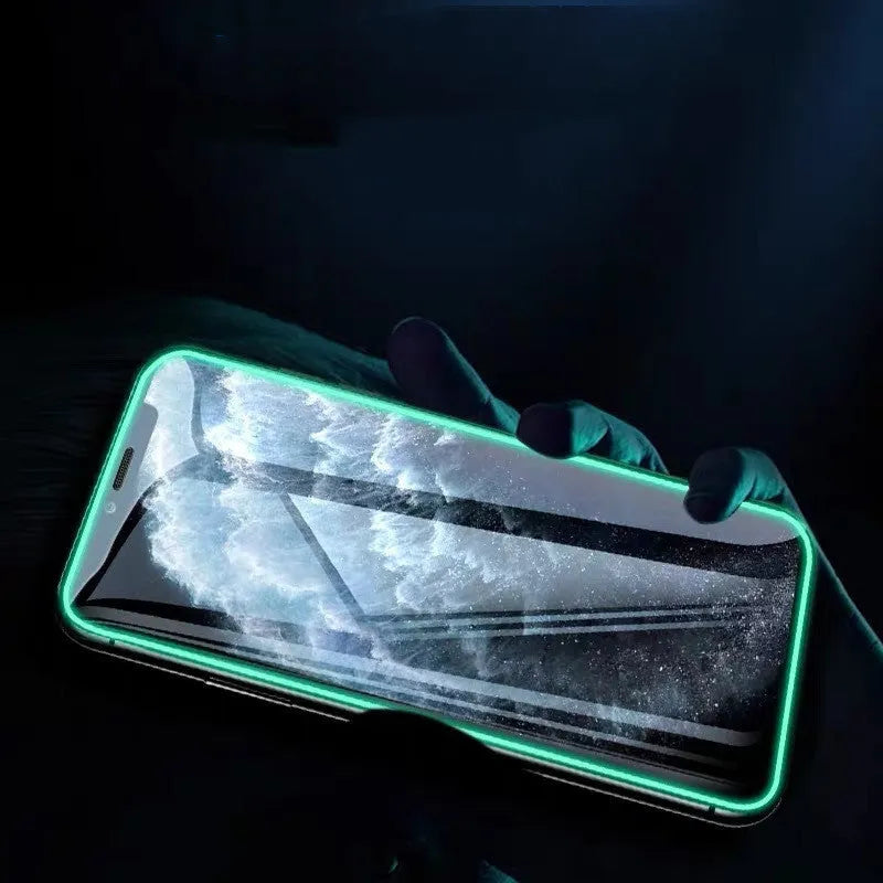 Luminous full cover tempered glass screen protector for iPhone showing glow effect in dark setting