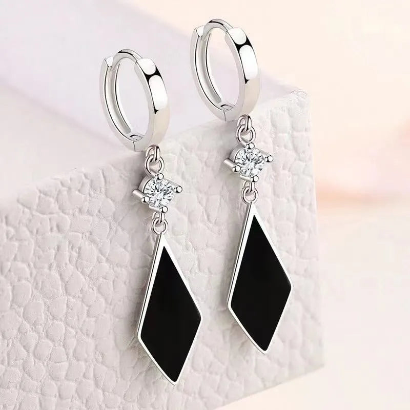 Vintage diamond geometric earrings with electroplated silver finish and ear clip fastening