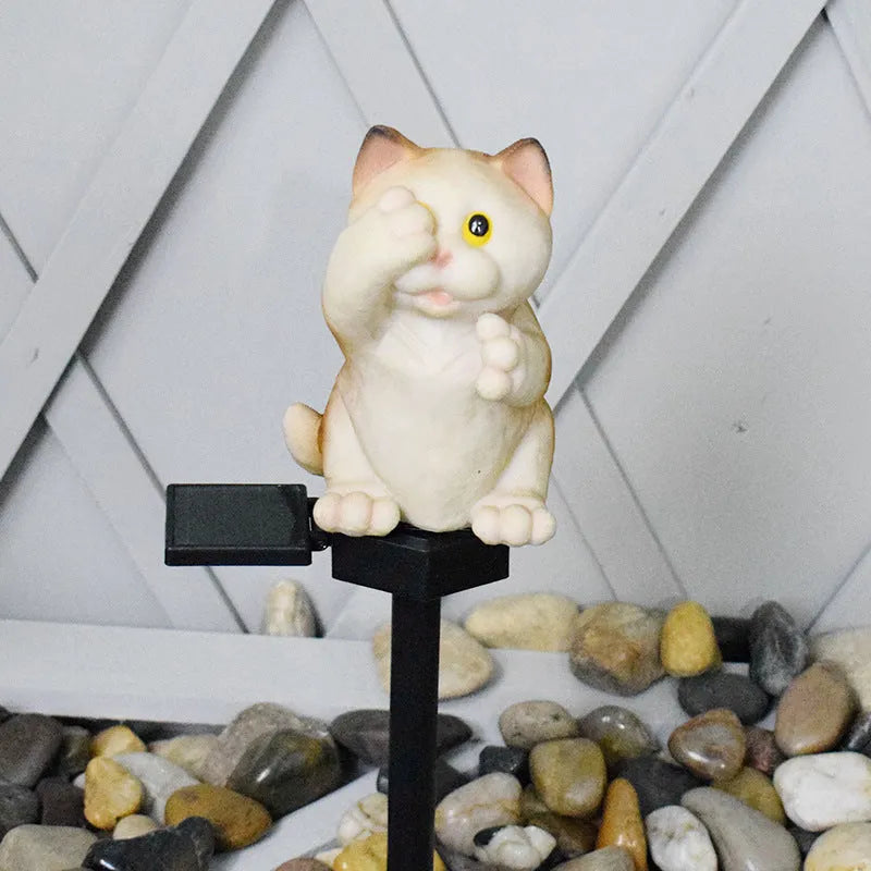 Solar cat lawn light with resin construction for garden pathways
