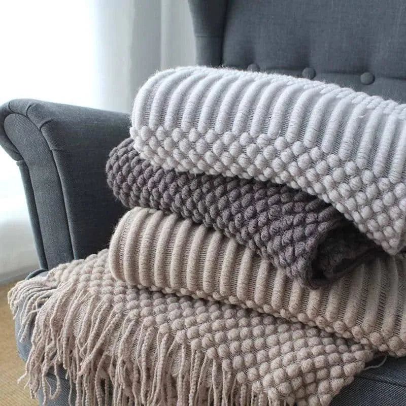 Small rectangular polyester nap blanket in dark grey, khaki, or light grey, shown flat with dimensions 127cm by 170cm.