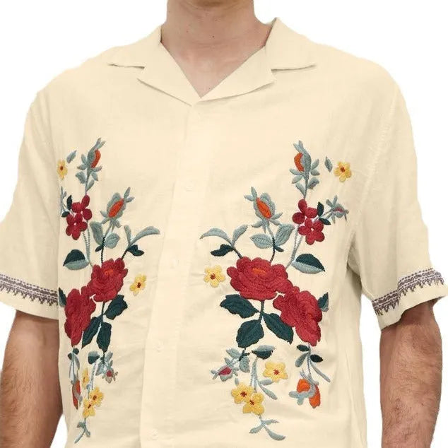 Apricot colour men's shirt with floral print pattern and lapel collar on white background