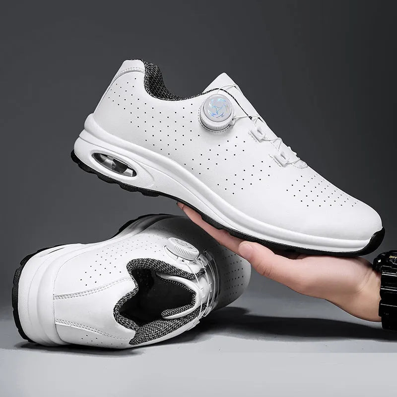 Low top mesh tennis shoes with cross straps and composite sole in black and white