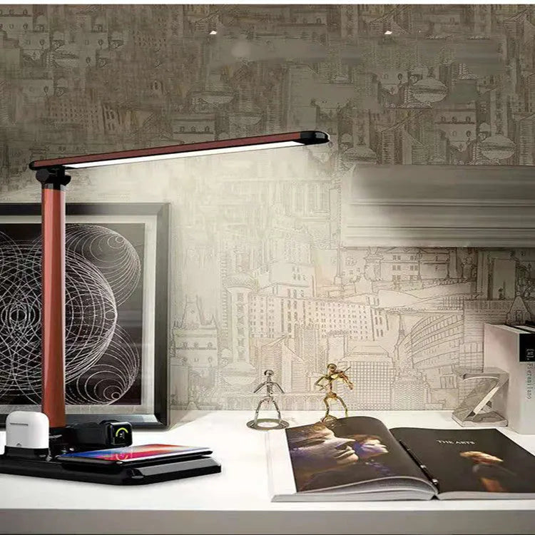 Black and white 4-in-1 LED desk lamp with wireless charging base and USB-C port