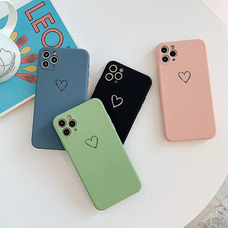 Solid colour TPU phone case for Apple iPhone in black, pink, and green showing precise cut-outs