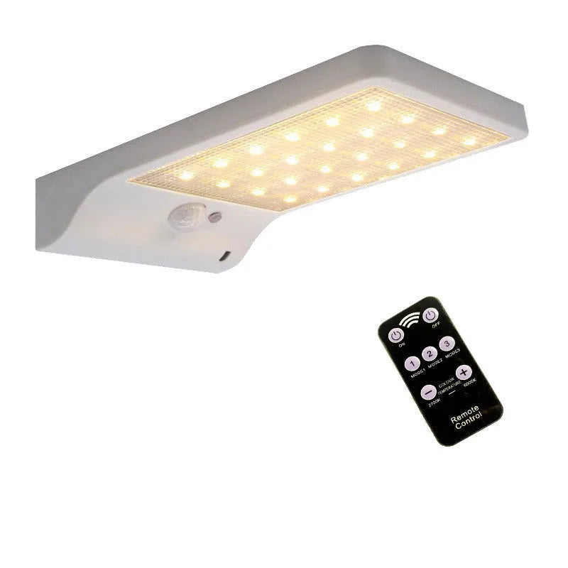 Black and white solar garden light with IP65 waterproof rating for outdoor courtyard and balcony use