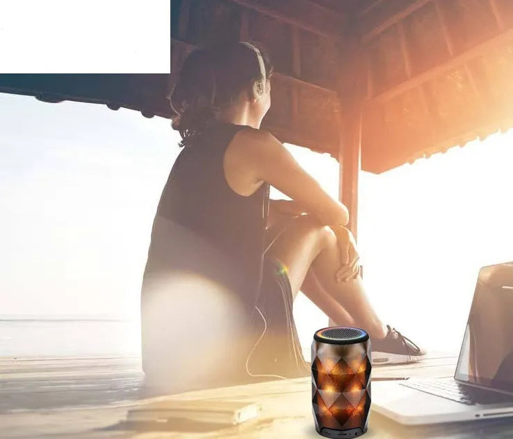 Black crystal Coca-Cola can lantern speaker with diamond-cut design and colourful starry sky lighting effect.