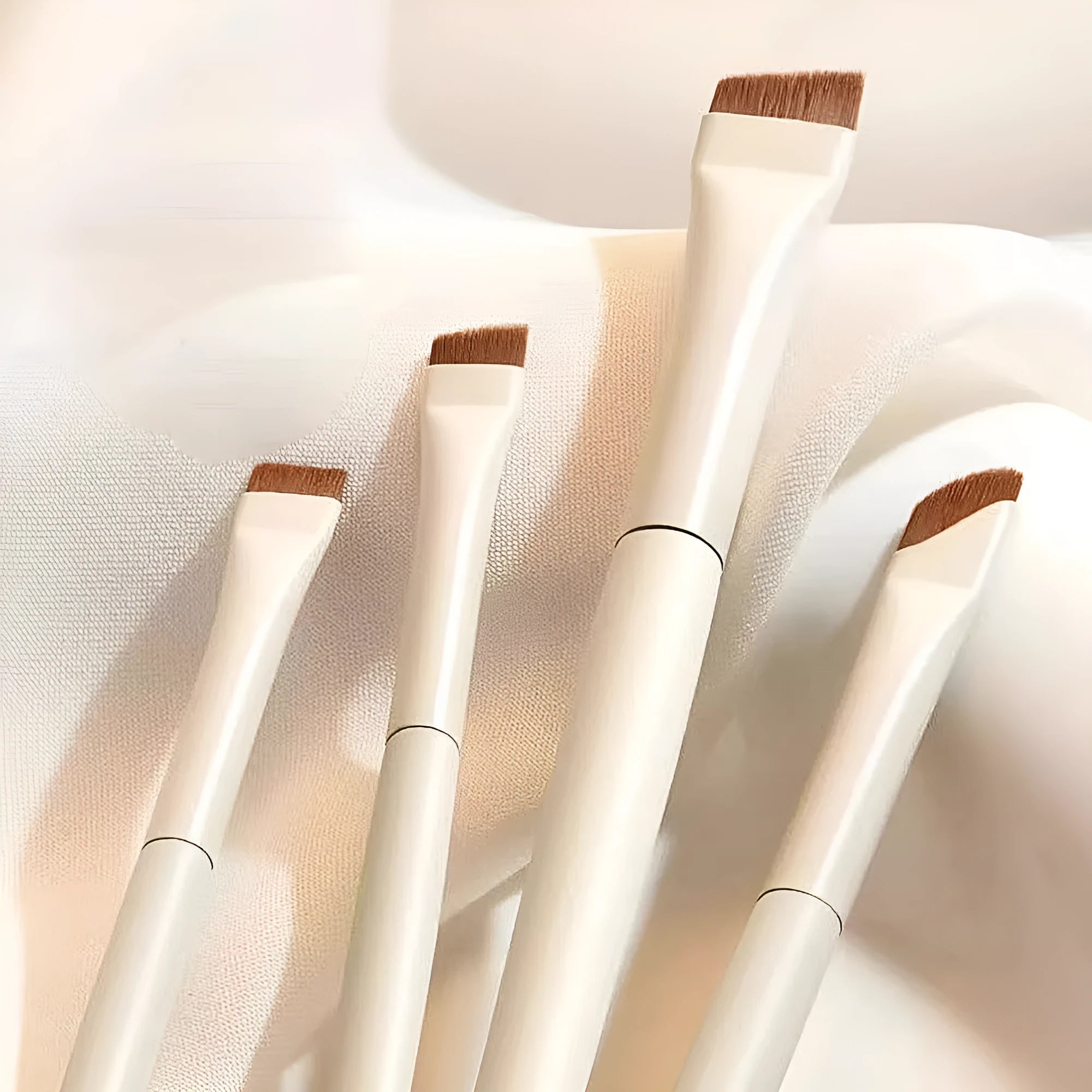 4 piece angled eyeliner and brow brush set with ultra thin precision brushes and leather case