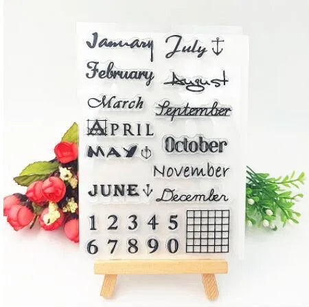 Close-up of a transparent silicone vintage calendar and digital table icon stamp on a white background.