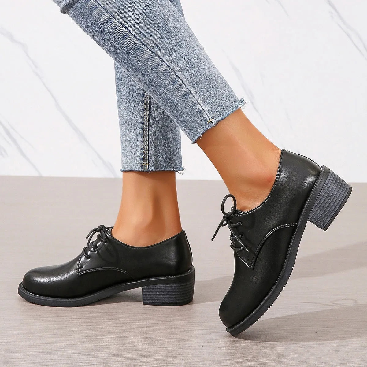 Black women's professional work shoes with chunky heel and pointed toe design