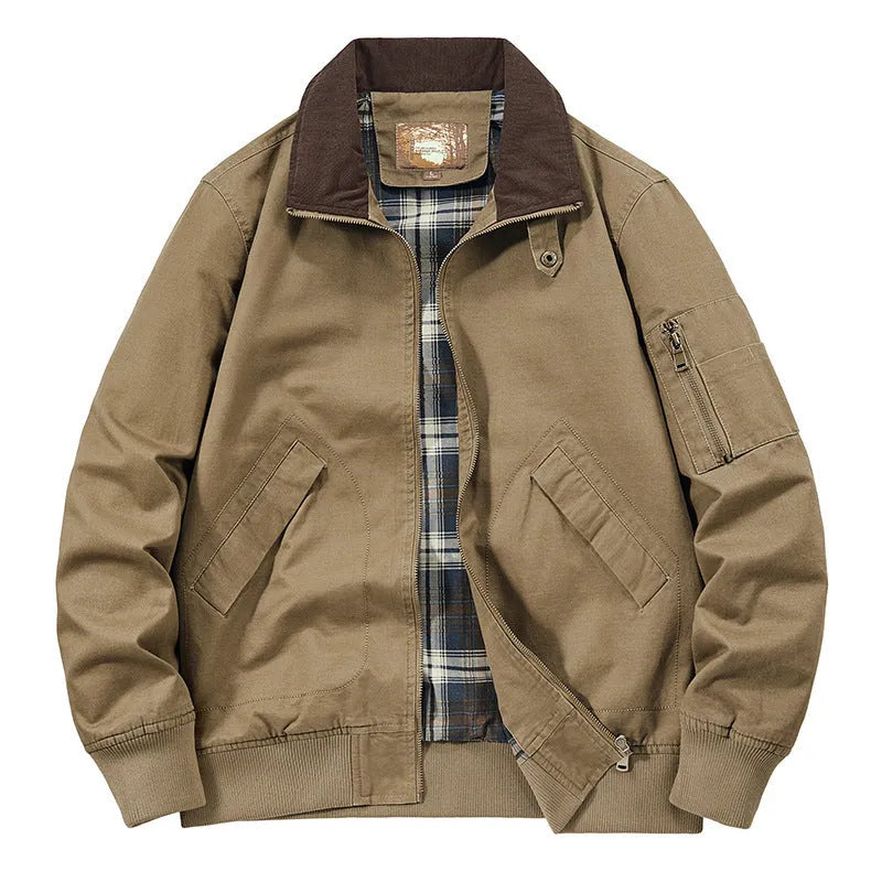 Men's camel coloured washed cotton baseball flight jacket on a hanger