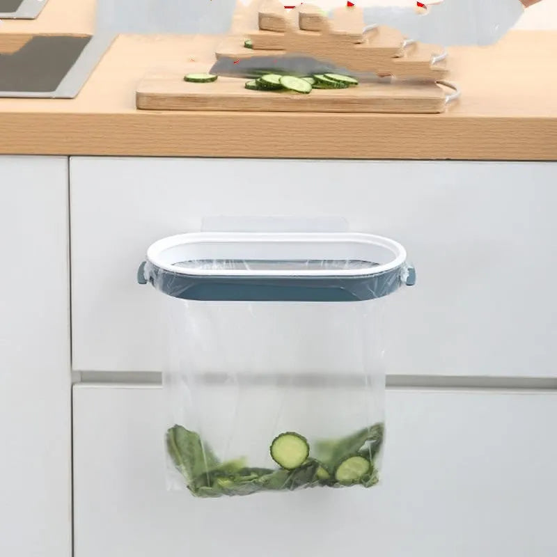 Plastic kitchen garbage bag storage rack in blue or pink for cabinet organisation