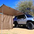 Black two-bedroom camping tent with aluminium alloy poles and Oxford cloth base erected outdoors.