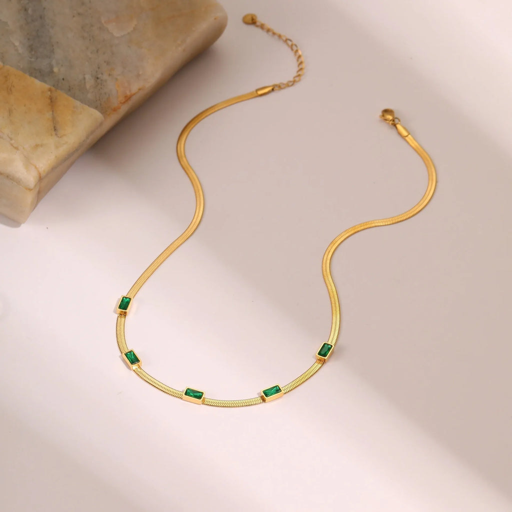 Retro geometric square zircon pendant on a stainless steel flat snake necklace chain.