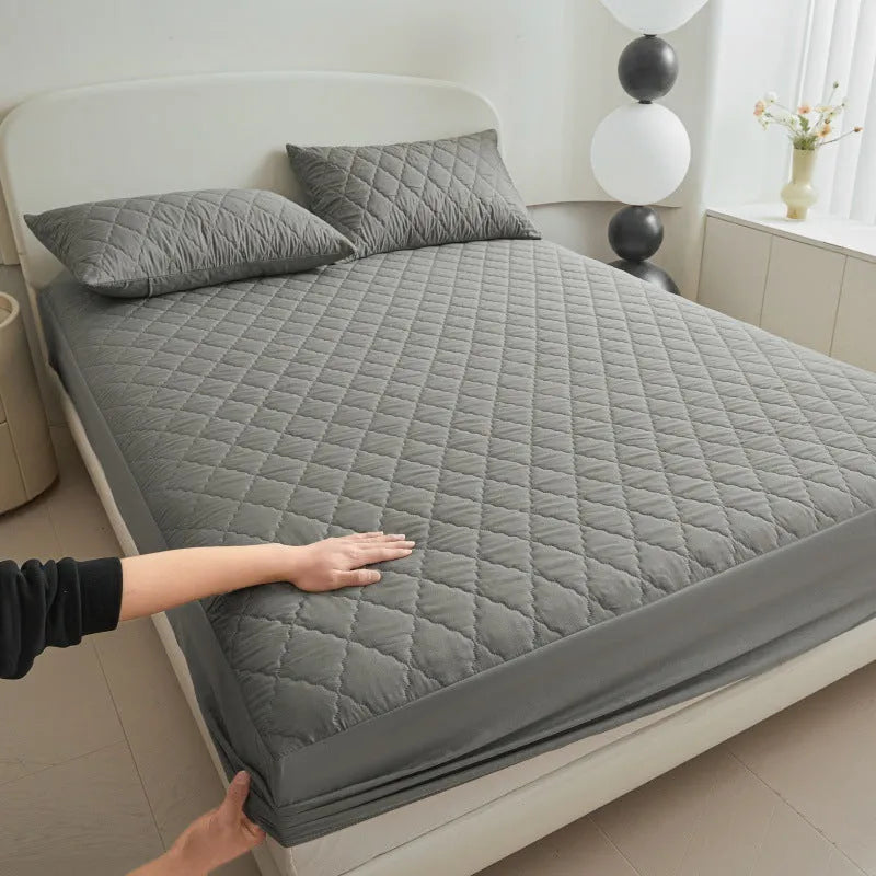 Diamond lattice quilted waterproof mattress protector in bamboo fibre, shown in a solid colour.