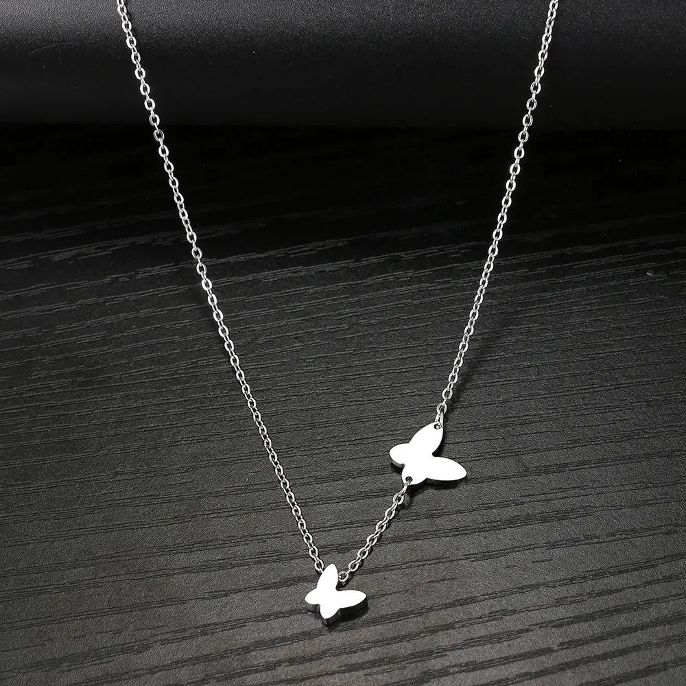Stainless steel butterfly pendant necklace with titanium steel bow insect pendant, O-shaped chain, gold or steel colour, 18K electroplated finish.