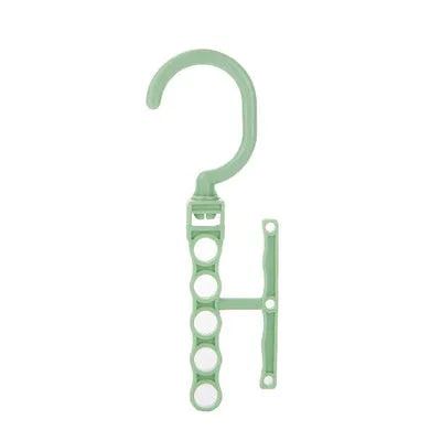Rotating wardrobe hanger with five holes and handle in blue, green, or pink colour options