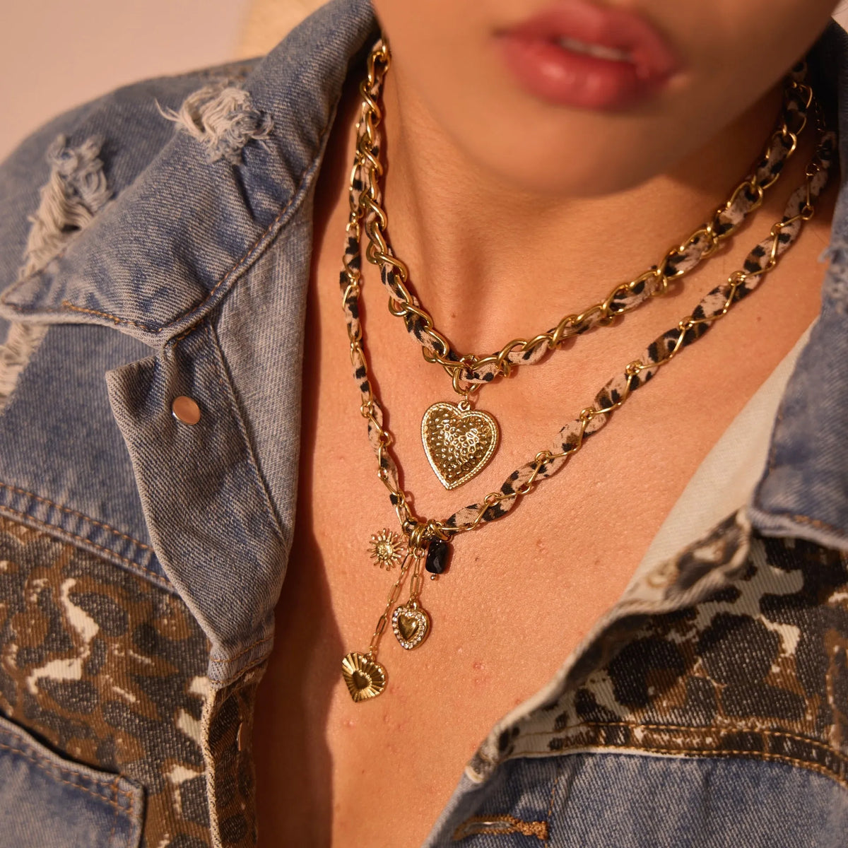 Women's stainless steel necklace with geometric leopard love pendant on adjustable chain
