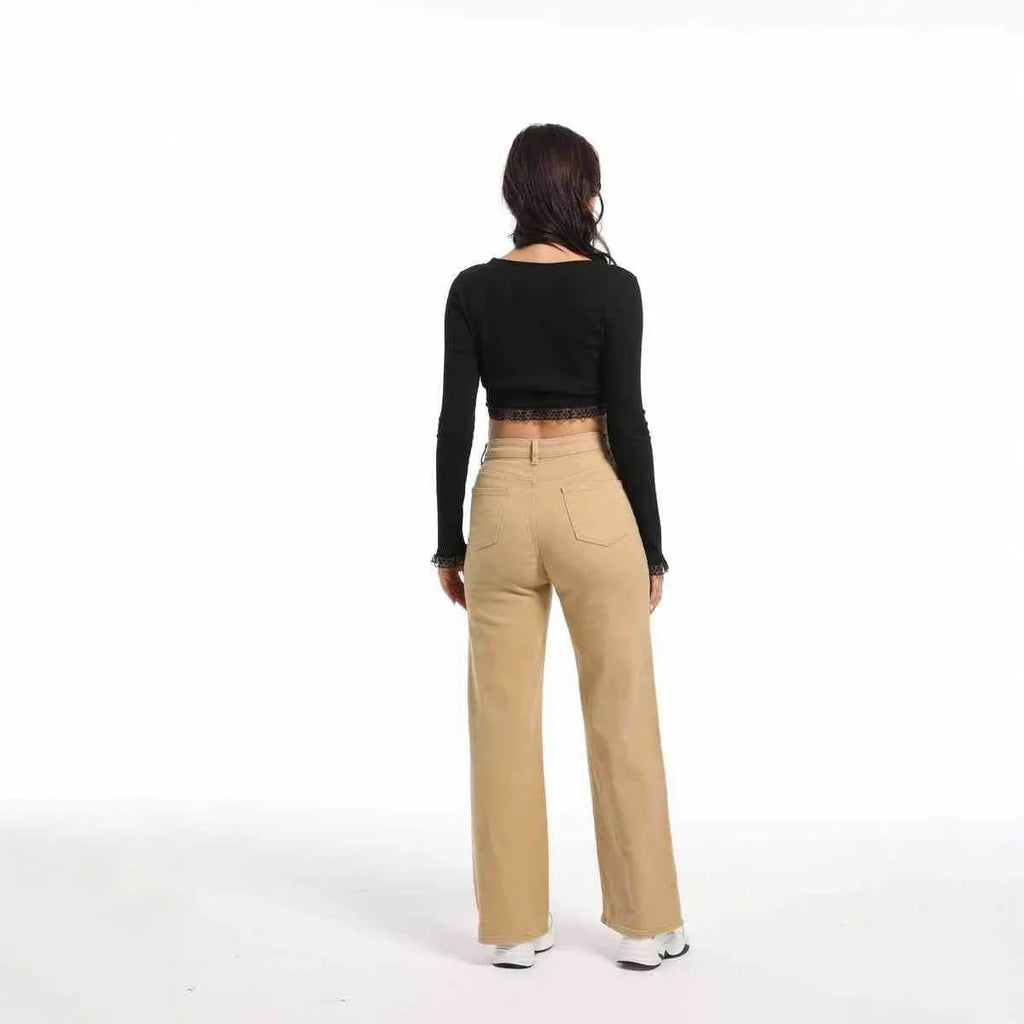 Women's high-waist straight wide-leg jeans in apricot colour, laid flat to show the cut and high-waist detail.