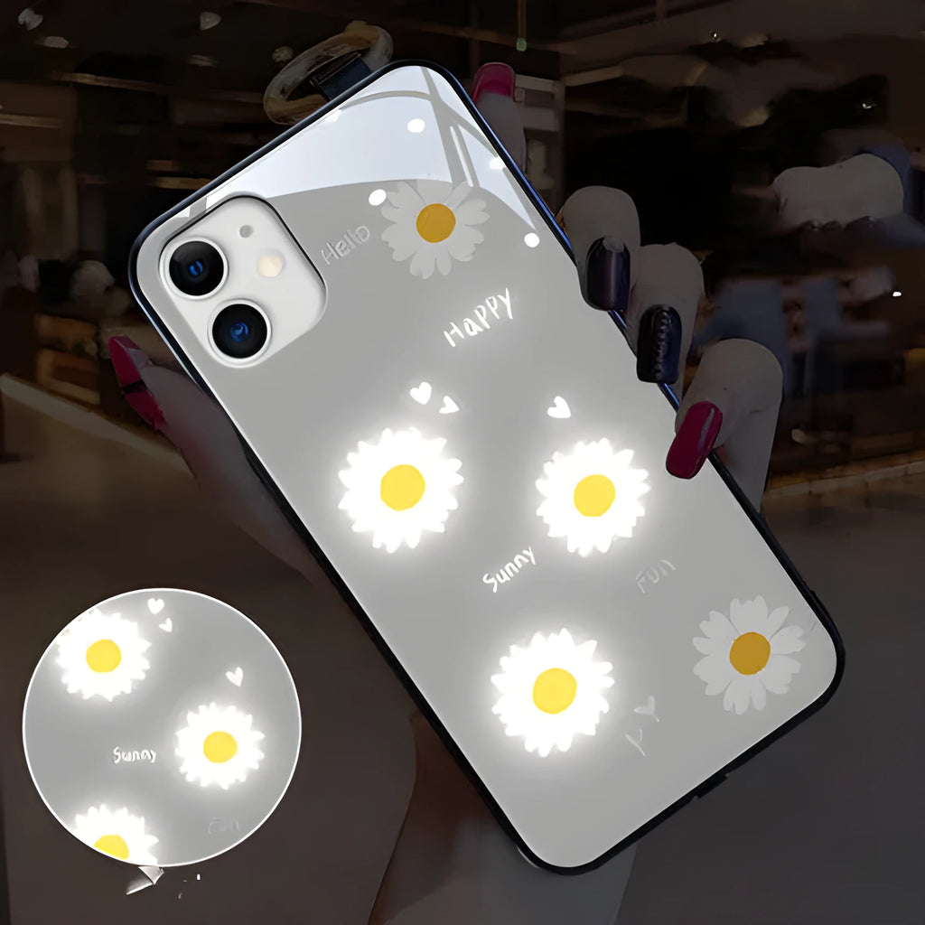 White daisy design luminous iPhone case with voice-activated colour light on a mobile phone.
