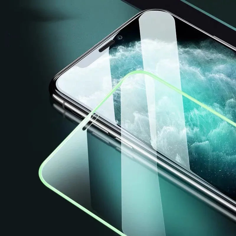 Luminous full cover tempered glass screen protector for iPhone showing glow effect in dark setting