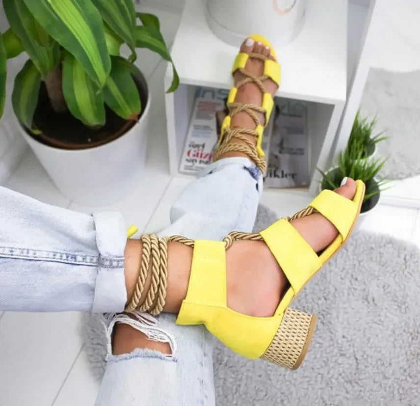 Women's suede front strap sandals with mid-heel, fish mouth toe, available in multiple colours.