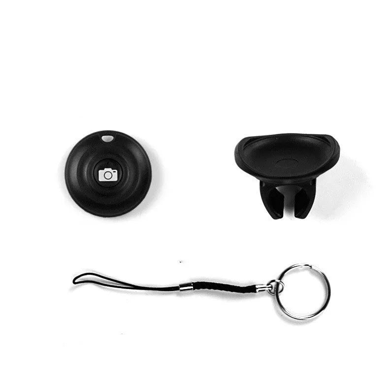Black Snap Bluetooth remote control for wireless smartphone and camera photos.