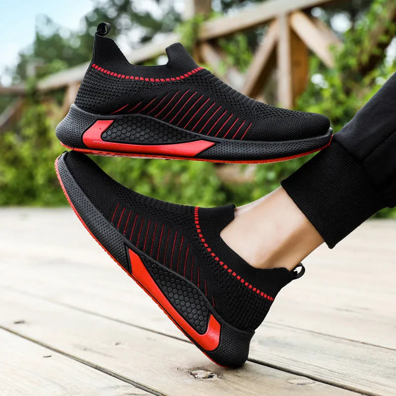 Men's flyknit mesh sneakers with striped design and plastic sole in black and white