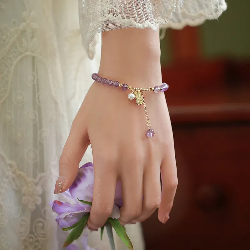 Natural crystal women's bracelet with romantic lavender amethyst colours and zodiac or animal modelling