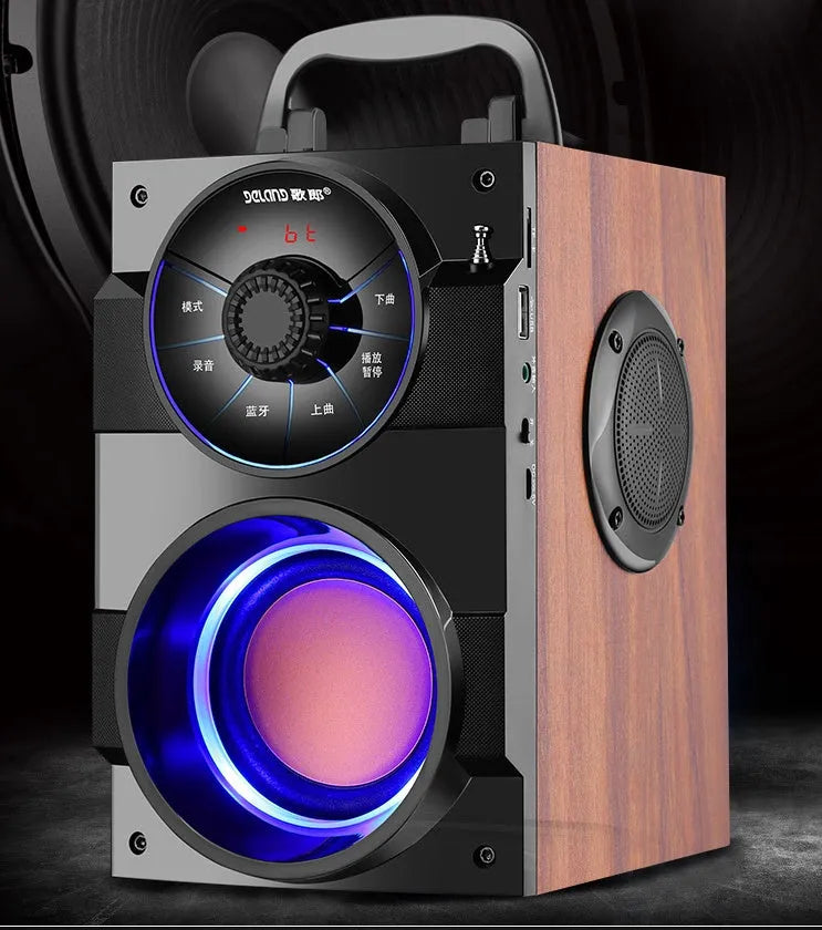 Black portable mini home audio system with subwoofer, satellite speakers, and a 3.5mm audio cable
