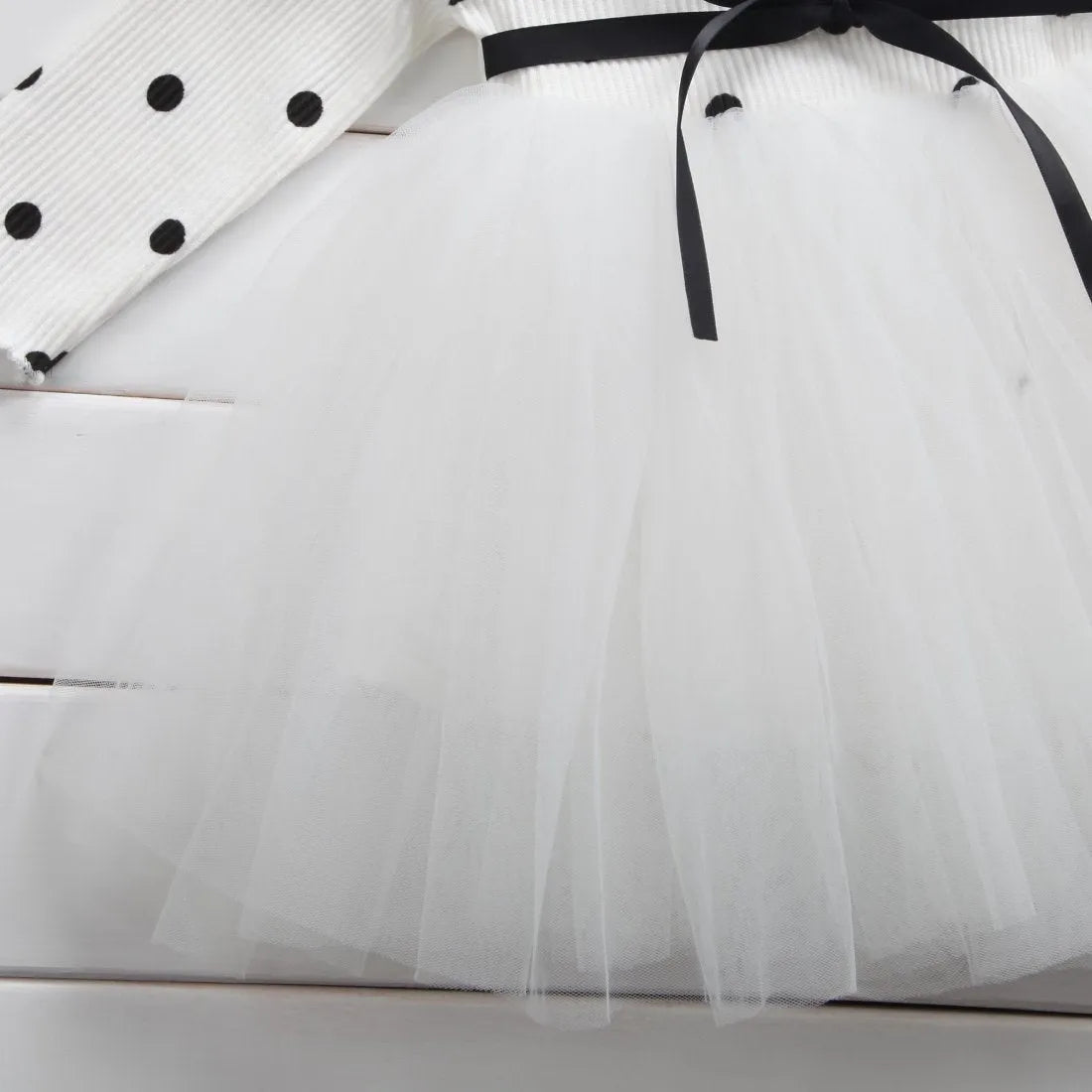 Baby girl's long sleeve lace tutu dress in black, pink, or white for birthdays and christenings
