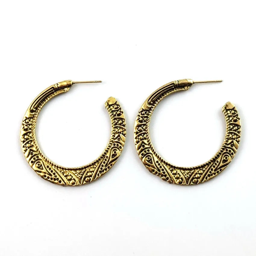 C-shaped alloy earrings with vintage engraving pattern in bronze colour showing curved design and butterfly clasp