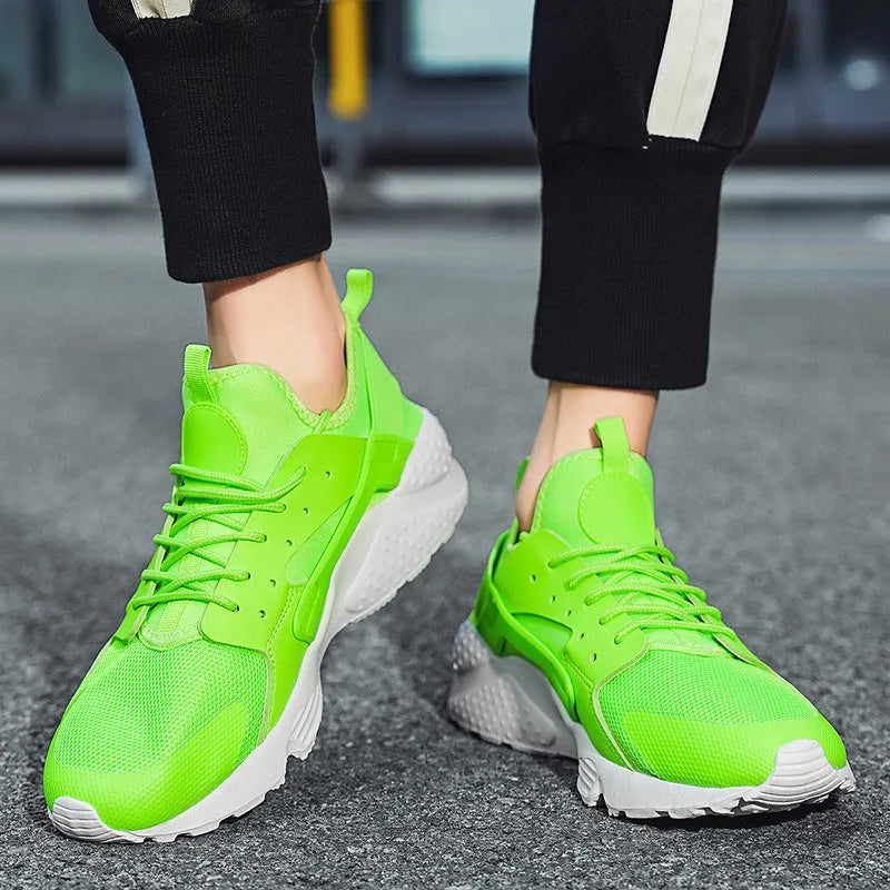 Men's low top casual shoes with mesh upper, cross shoulder straps, and round toe in fluorescent colour options