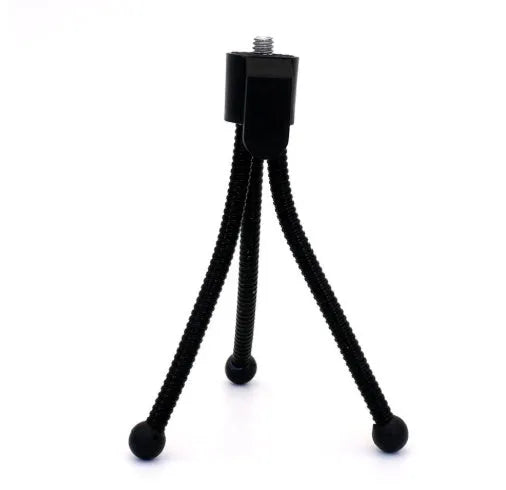 Small iron desktop tripod with ball head in folded position showing compact size