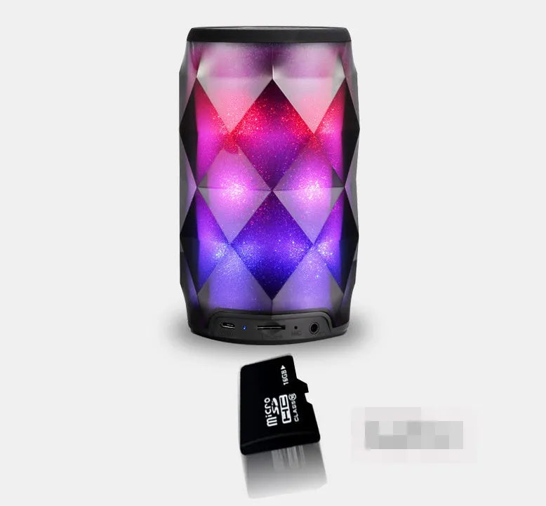 Black crystal Coca-Cola can lantern speaker with diamond-cut design and colourful starry sky lighting effect.
