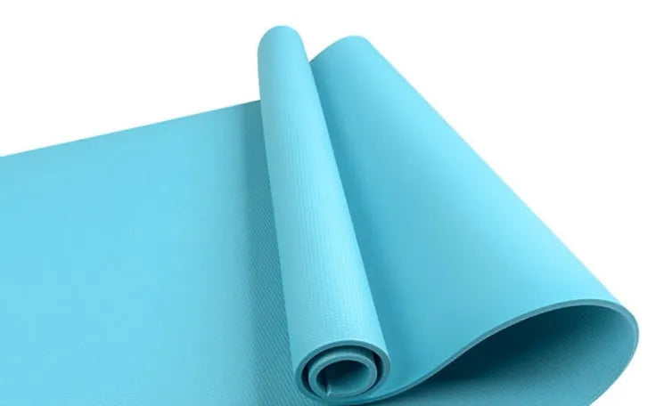 EVA yoga mat in blue showing textured anti-skid surface with thickness options