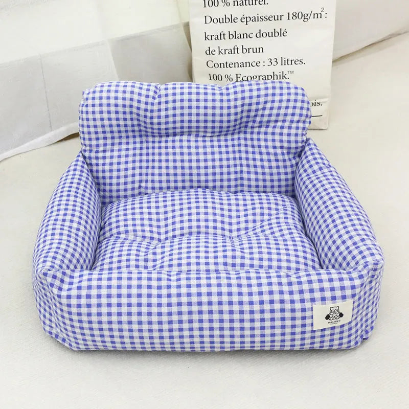 Grey and blue plaid car-mounted pet nest for dogs with stain-resistant cloth construction