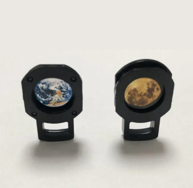 USB-powered Earth and Moon projection lamp with flexible hose bracket on a wooden table.