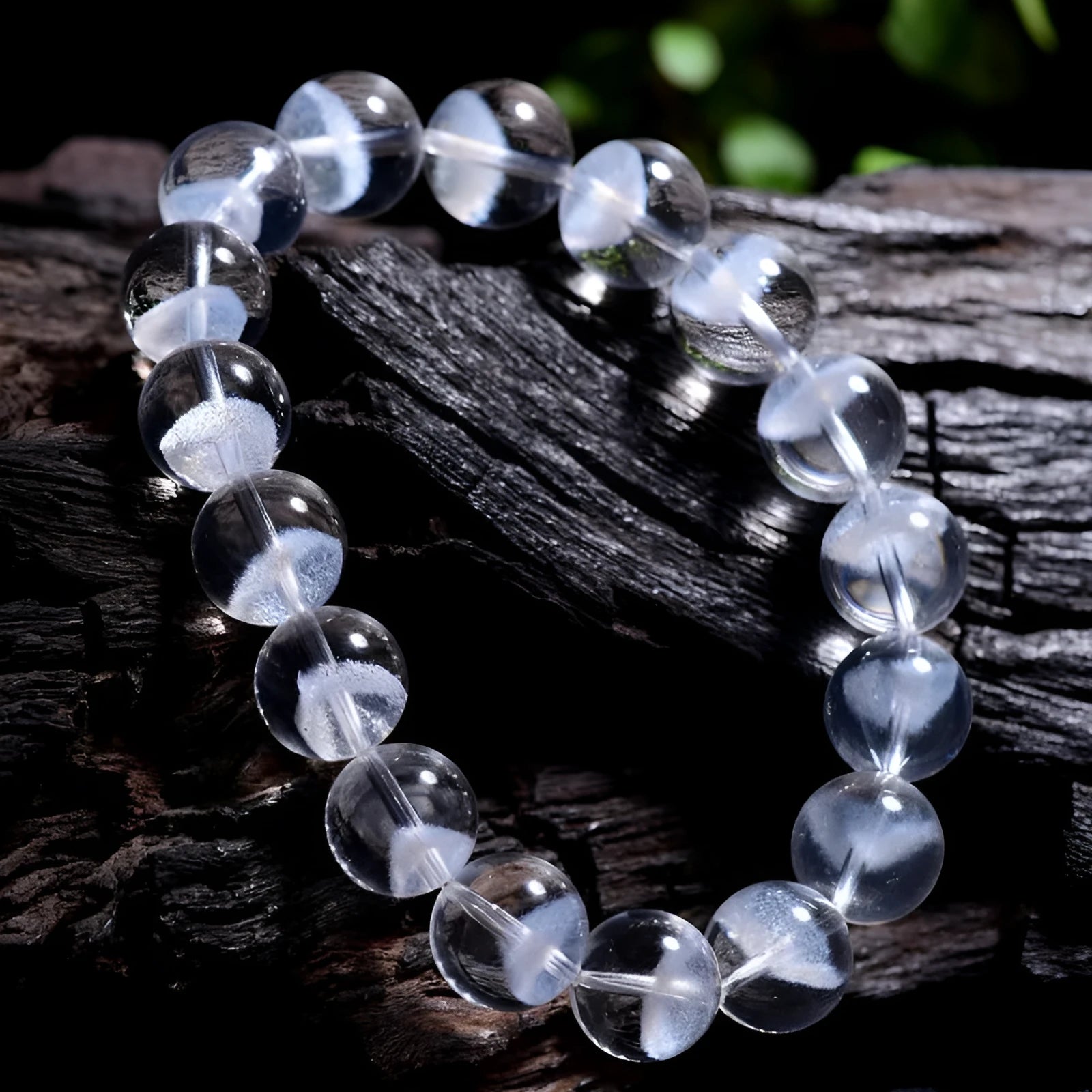 Women's white crystal ghost pyramid bead bracelet with Ruyi symbol design.
