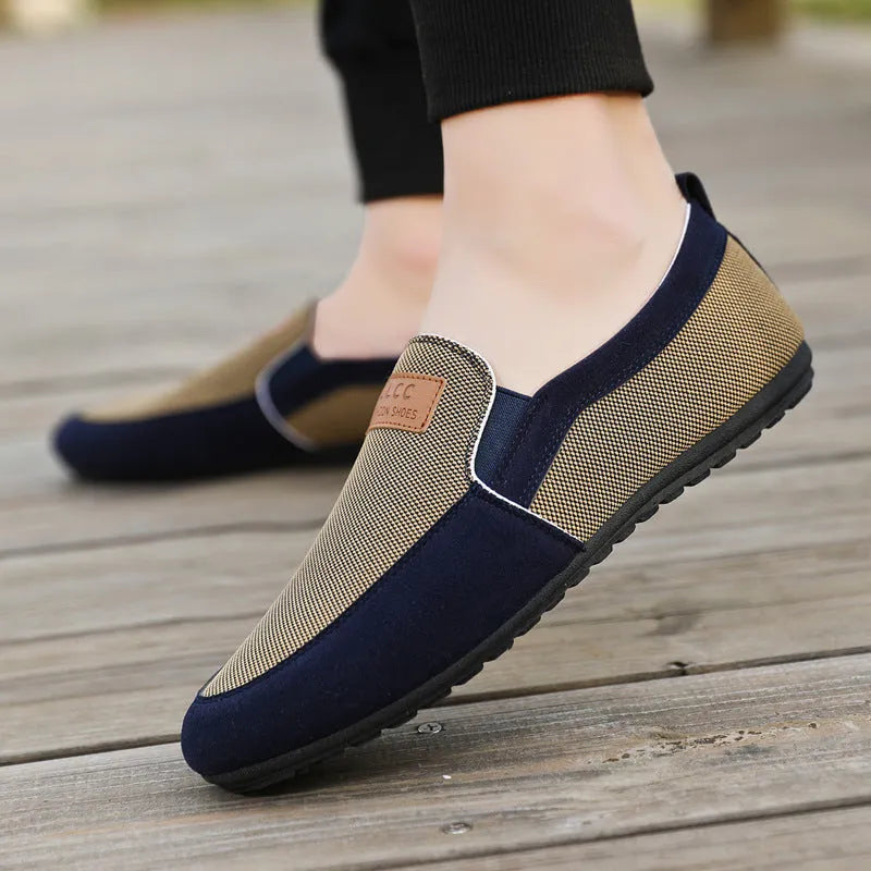 Men's grey canvas board shoes with round toe and rubber soles