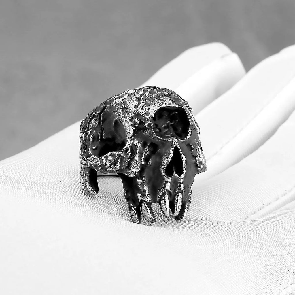 Silver alloy one-eyed skull ring with electroplated finish available in sizes 7 to 13