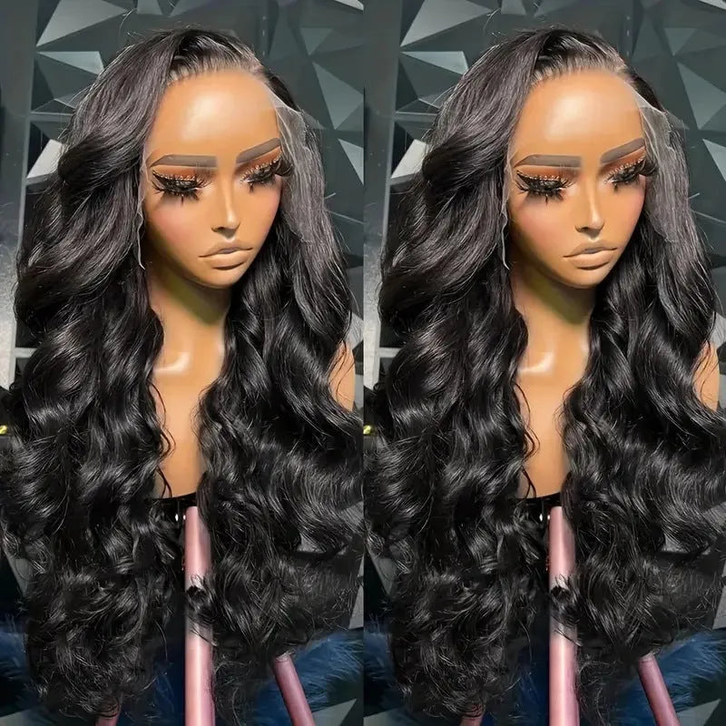 Black synthetic full-head wig with medium-long curly waves, shown on a model or wig stand.