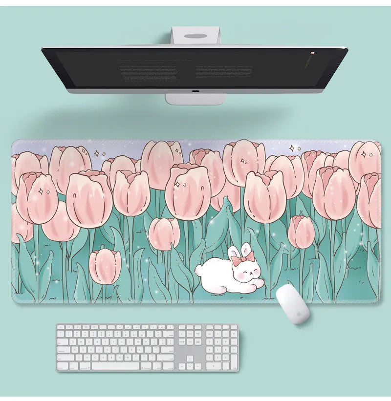 Floral pattern mouse pad on desk with keyboard, showing non-slip rubber base and colourful flower design