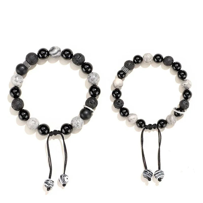 Black agate map stone and volcanic rock bracelet with diamond shaped beads in 8mm and 10mm sizes.
