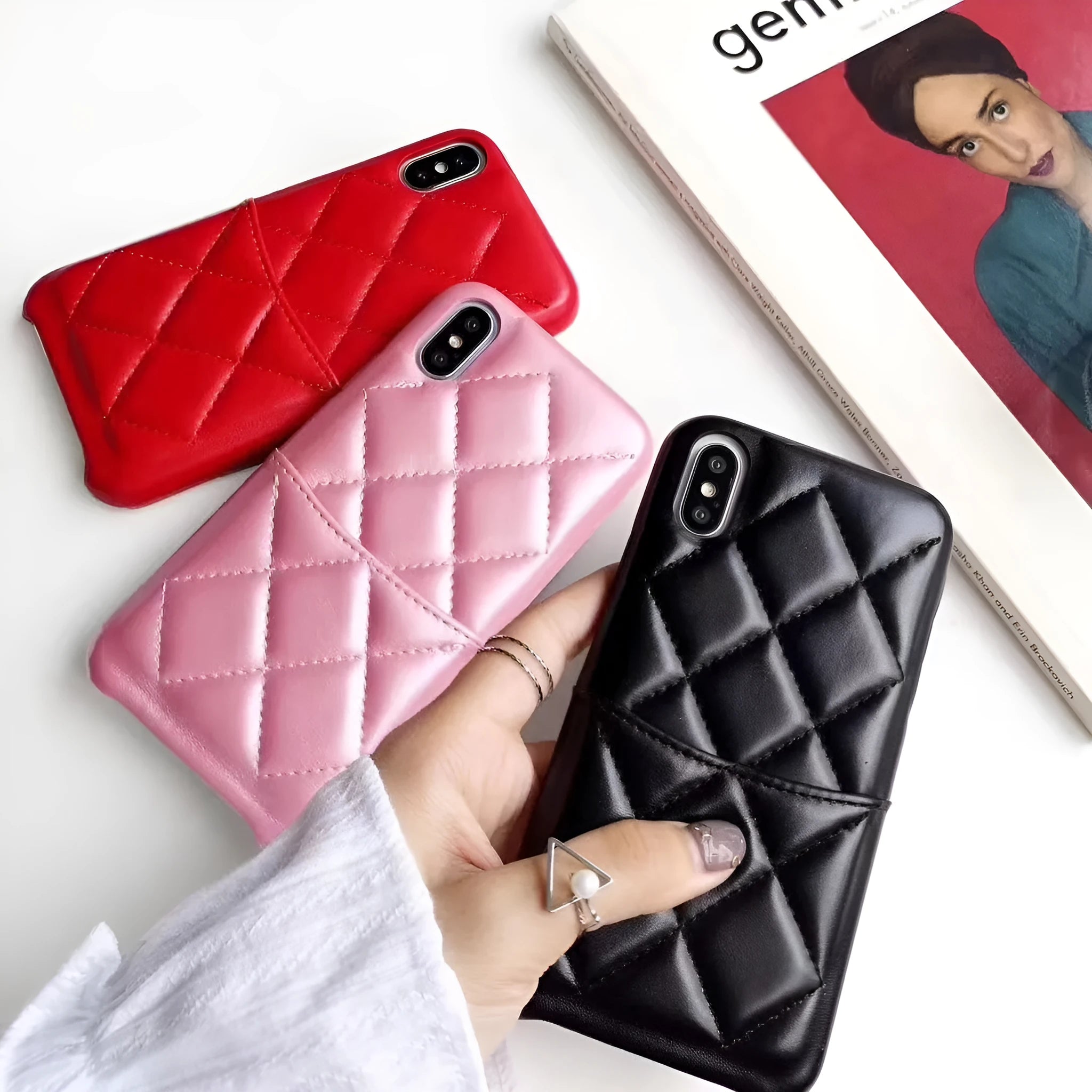 Leather iPhone case shown in black, pink, and red, compatible with XS Max, XR, X, 8, 7, and 6 models.