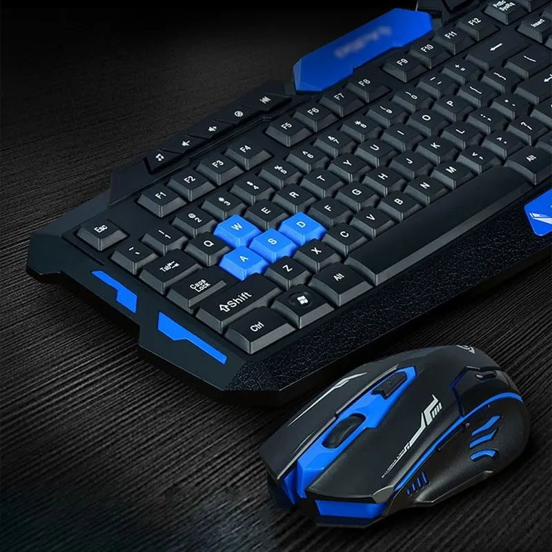 Blue and black wireless keyboard and mouse set on a desktop