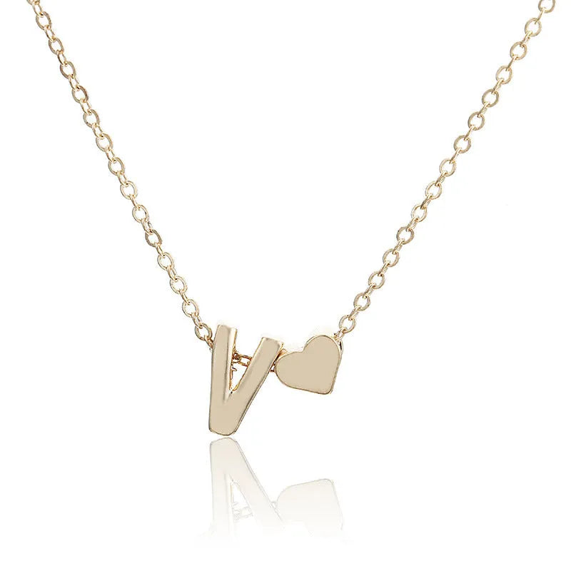Peach heart shaped letter necklace pendant in gold and silver tone alloy jewellery